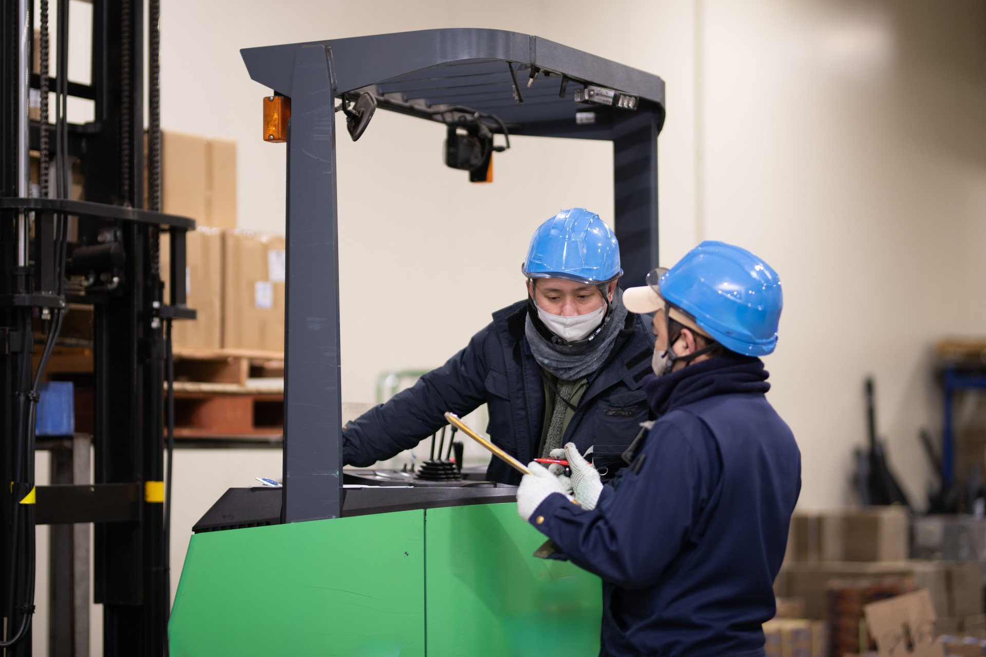 Two men working in a warehouse